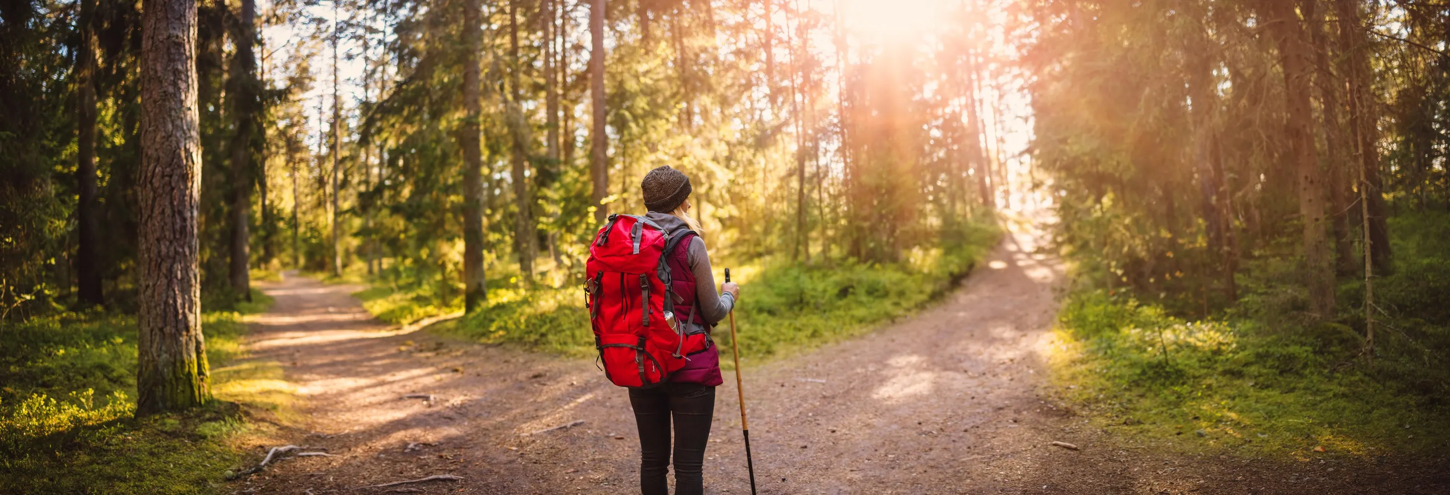 Woman hiking and going camping in nature.