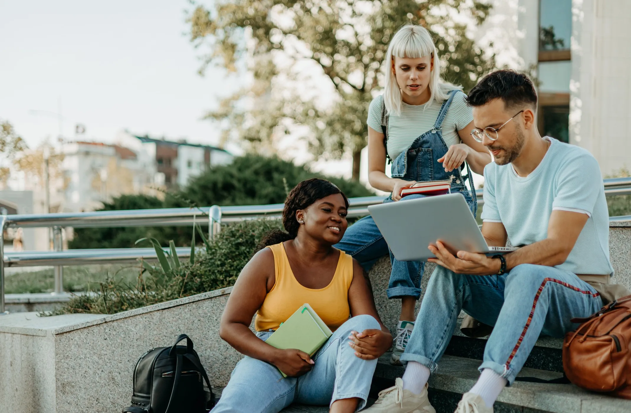 Three college students discuss smart money moves for their financial future.